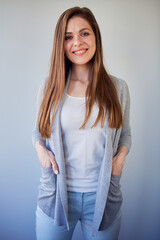 Happy girl with long hair wearing casual clothes. isolated portrait.
