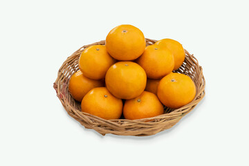 organic ripe mandarins in basket on white background.