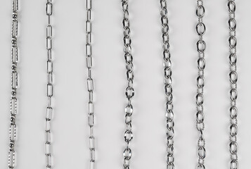Set of different chains on white background. Chain connection, types of metal chains