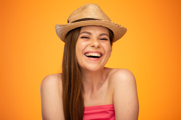 Happy woman in Mexican hat with bare shoulders, face girl portrait isolated over orange yellow background.
