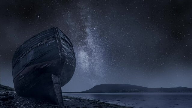 Shipwreck in Fort William and milky way in Scotland, timelapse