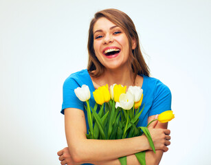 Laughing woman holding flowers bouquet.