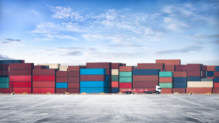 Containers Yard on blue sky background and floor ground with container truck, Global Business Logistics import export goods of freight carrier, industrial port, cargo transportation industry concept - obrazy, fototapety, plakaty