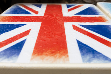 Fototapeta premium United Kingdom Flag (Union Jack) on the tables surface