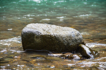 The background of the stones that are stagnant in the river water