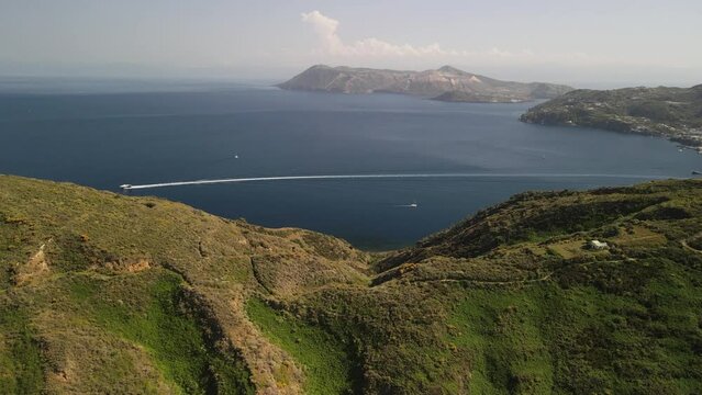 Aeolian Islands. Lipari town aerial view with drone overlooking Canneto Beach, Lipari city centre and Vulcano