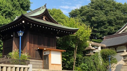 The green roof traditional shrine house of Japan, “Gojyoten Jinjya”, clear blue sky June 10th year 2022