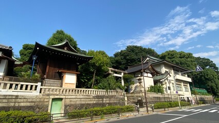 The overall house of Japanese shrine facade, “Gojyoten Jinjya” in Ueno park year 2022 June 10th sunny weekday