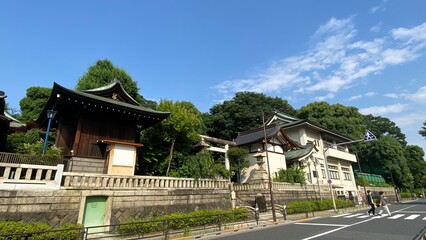 Fototapeta na wymiar Clear blue sky and the beautiful aged Japanese shrine house on a clear blue sky sunny day, year 2022 June 10th