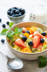 Healthy fresh fruit salad in a bowl