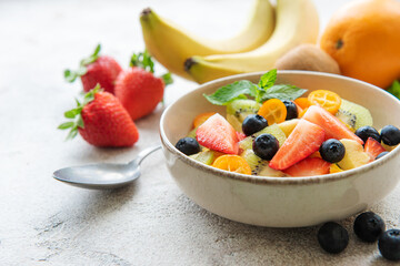 Healthy fresh fruit salad in a bowl