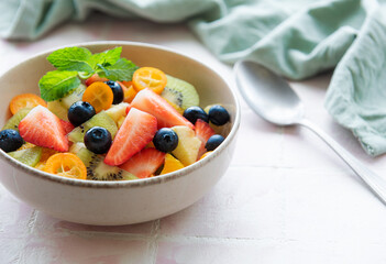 Healthy fresh fruit salad in a bowl