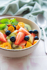 Healthy fresh fruit salad in a bowl