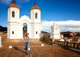 A girl near the monastery of San Felipe Neri from the Church of La Merced in Sucre, Bolivia.
