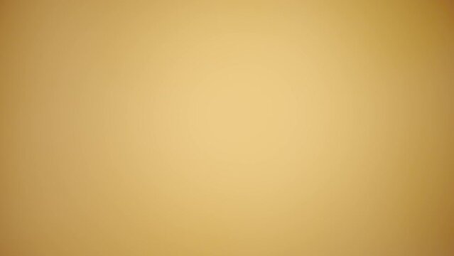Explosion of dried unpeeled peanuts on yellow studio background. Nut beans splash and scattering close up. Ingredient for making desserts. Peanuts in shell pouring. Dry legumes, healthy nuts. Slow