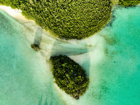 Aerial Top Down View Of A Small Island Along Wajag Island Archipelago, Raja Ampat, West Papua, Indonesia.