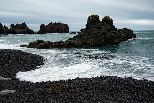 Bizarre black basalt rock formation called B&aacute;r&eth;arskip (&ldquo;Ship of B&aacute;r&eth;ur&rdquo;) in the small bay of Dritv&iacute;k, near Dj&uacute;pal&oacute;nssandur, Sn&aelig;fellsnes, Iceland. 