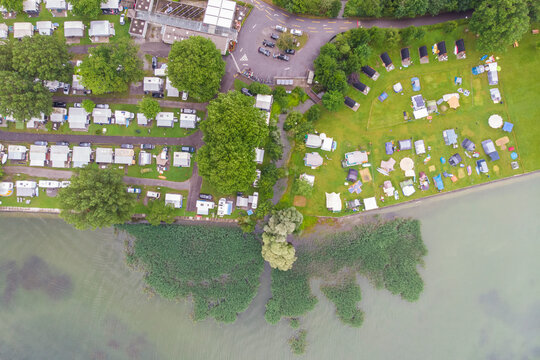 Aerial view of a residential district and a camping area along Obersee lake in Arbon, Switzerland.