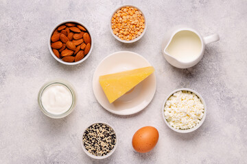 Products rich in calcium on dark background.