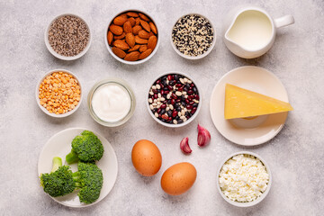 Products rich in calcium on dark background.