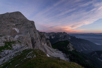 Hiking at the top of the mountain at sunset