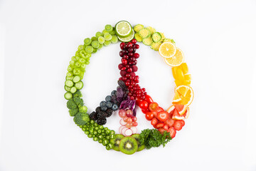 peace sign made of fruits, on a colorful white background