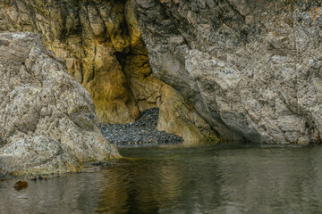 The Peninsula of Howth Head on a foggy day, the cliffs warped by fog, Dublin, Seashore of  cliffs, bays and rocks landscape, dangerouse cliffs, spectacular views in Ireland , Ireland