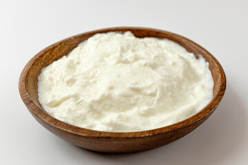 Fototapeta na wymiar Greek yogurt on a white background