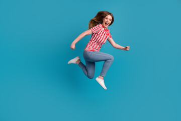 Fototapeta na wymiar Full body profile side photo of young woman jump up runner hurry store isolated over blue color background