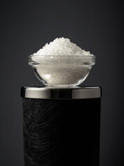 Sea salt in a small glass bowl.