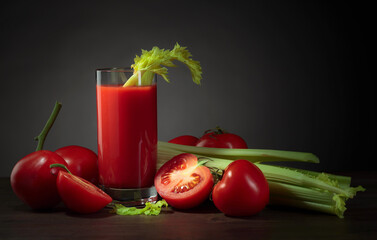 Tomato juice with celery sticks.