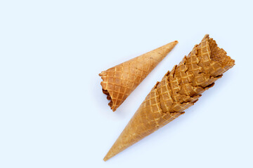 Empty ice cream cone on white background.