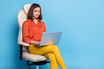 Profile side photo of young woman chat report laptop sit chair manager isolated over blue color background