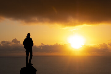 Man and sunset sun over the sea, Euskadi