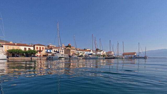 Underwater split photo of picturesque fishing village of Galaxidi with beautiful neoclassic houses and marine history, Fokida, Greece