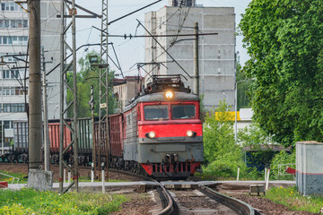 Fototapeta na wymiar Freight train arrives to the station.