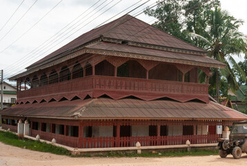 Exterior of an old wooden building in Muang Sing village, Luang Nam Tha province, Laos, Asia