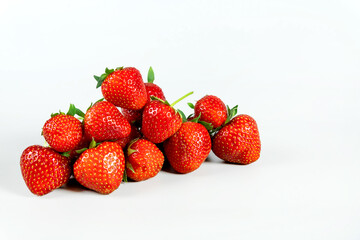 Fresh ripe strawberries on a light background