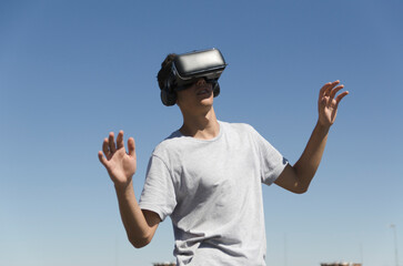 Virtual Reality Experience young man having a funny moment