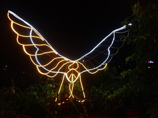 colored lights in the form of bird in the garden