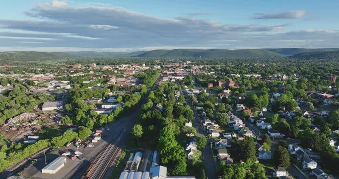 Late afternoon spring, summer aerial video of area around Elmira New York