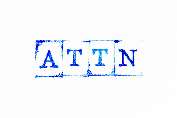 Blue color ink rubber stamp in word ATTN (Abbreviation of attention) on white paper background