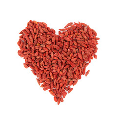 Obraz na płótnie Canvas Dried goji berries red heart shape isolated on white