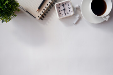 Cropped shot view of office desk table office equipment, labtop, tablet and other office supplies on the modern space, flat lay.
