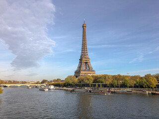Fototapeta na wymiar Eiffel Tower over the Seine in Paris, France