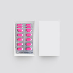 Package with medicinal pills on gray background. top view