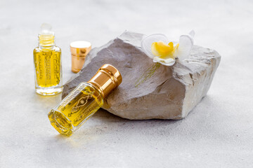 Bottles of agarwood tree oil perfume, close up. Traditional Arabian fragrance