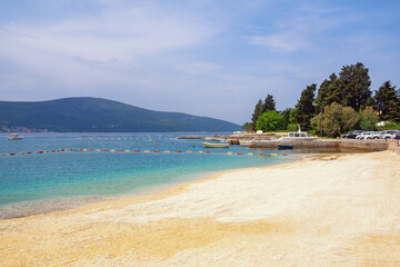 Beautiful Mediterranean landscape on sunny summer day. Montenegro, Adriatic Sea.. View of Bay of Kotor near Tivat city