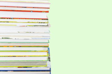 Stack of children colourful books with copy space.