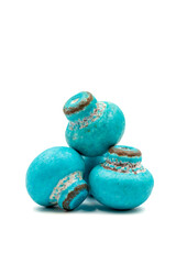 Mushroom chocolate isolated on white background. Close-up. Mushroom-shaped coated chocolate dragee